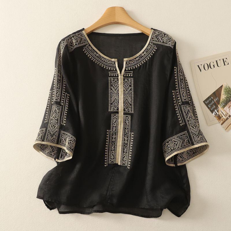 Blúz Tencel-kender anyagból, laza fazon, középméretű ujjak, kerek nyakú, standard hossz 50–65 cm