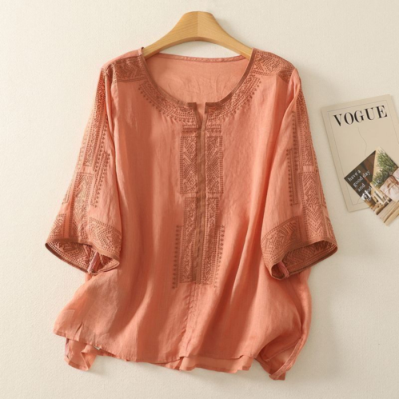 Blúz Tencel-kender anyagból, laza fazon, középméretű ujjak, kerek nyakú, standard hossz 50–65 cm