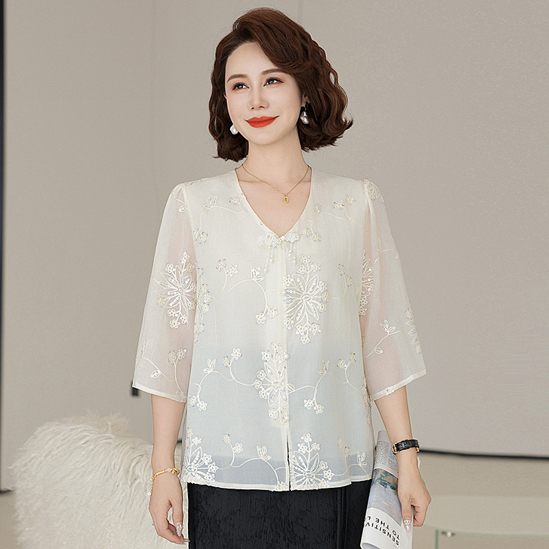 Női felső flitteres hímzéssel, V-nyakú, 3/4-es ujjas, laza szabás, poliészter, egyszínű, normál hossz