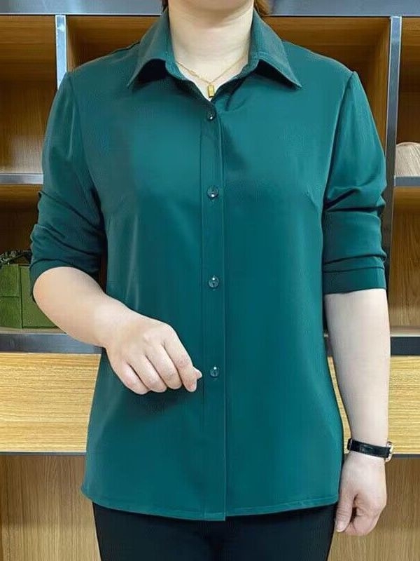 Poliesterska bluza s kvadratnim izrezom i polo ovratnikom, opuštena silueta, 3/4 rukavi, prednja kopčana planka s višestrukim kopčama, uredski stil.
