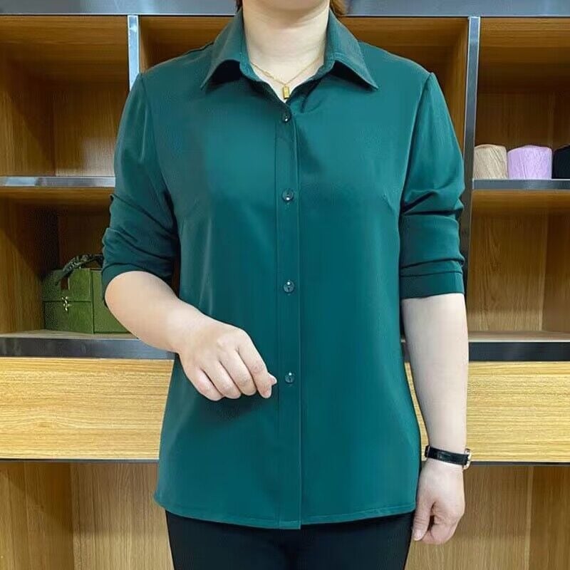 Poliesterska bluza s kvadratnim izrezom i polo ovratnikom, opuštena silueta, 3/4 rukavi, prednja kopčana planka s višestrukim kopčama, uredski stil.