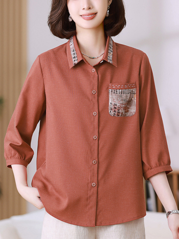 Женска риза от полиестер 80–90% и коноп (<30%), свободна кройка, ръкав 7/8, яка с ревера, дължина 50–65 см