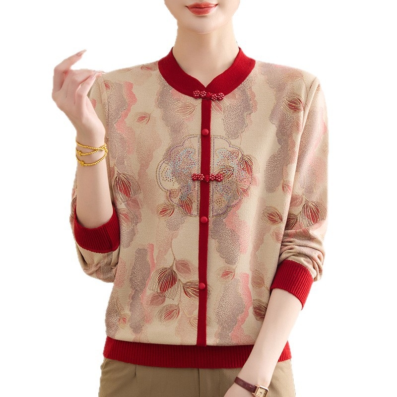 Top tricotat lejer pentru femei cu imprimeu floral, glugă, croială lejeră, guler rotund; poliester 90–95%.