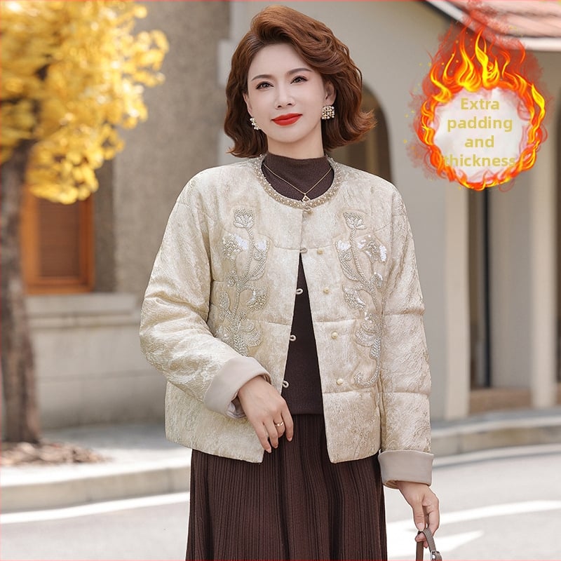 Jachetă scurtă de iarnă pentru femei, material principal poliester 95%+, umplutură din imitatie de mătase-cotton, glugă, model abstract, lungime medie 50–65 cm.