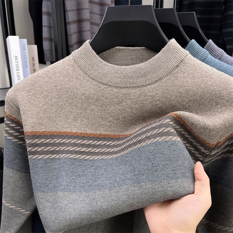 Storas vyriškas megztinis su dryžiniu mezginiu, apvali kaklo iškirptė, jacquard raštas, vilna 76–80% ir medvilnė, žiemai šilta bazinė dalis