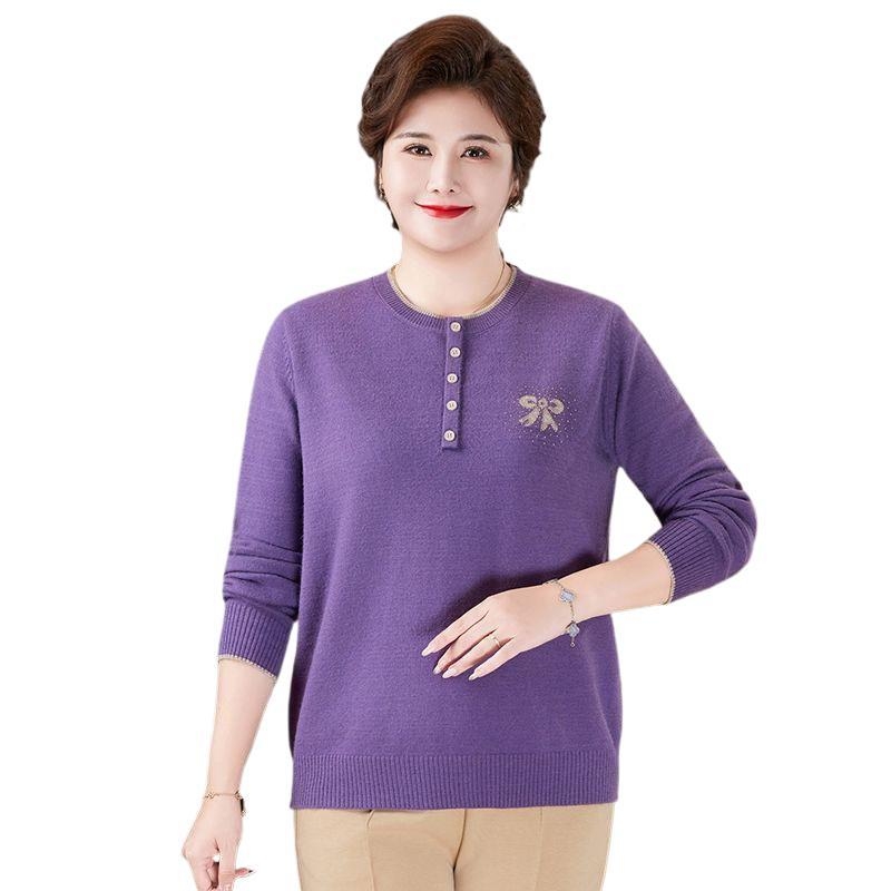 Megzta palaidinė vyresnėms moterims su apvaliu kaklu, 3/4 rankovės, laisvas kirpimas, siuvinėjimas ir sagos