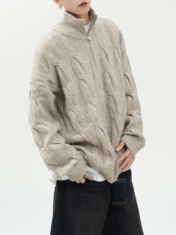 Kötött kardigán fél magas gallérral, csavart virág mintával, cipzárral, laza szabású