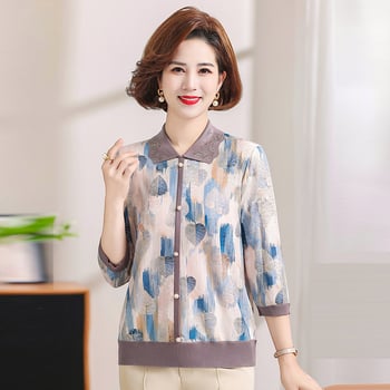 Hosszú ujjú kötött felső reveres gallérral, poliészter (90–95% tartalom), nyomott mintával, városi stílushoz