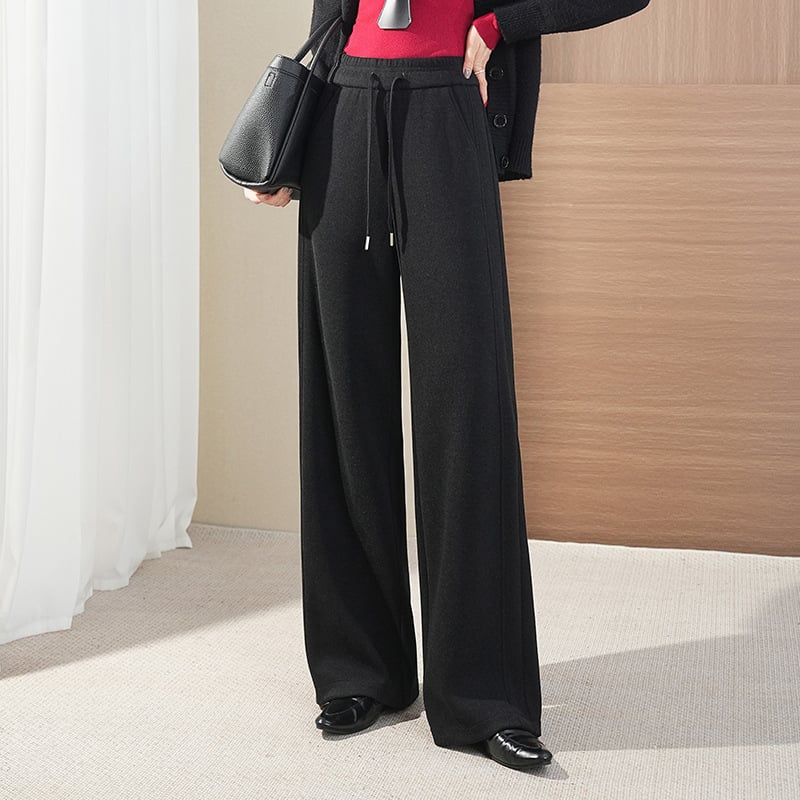 Toamnă 2025: pantaloni largi de tip mamă, talie înaltă și croială harém, material imitație de lână (poliester 50–70%, fibre de bambus 30–50%), elasticitate micro-bounce