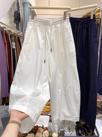 Női gyorsan száradó lezser nadrág, könnyű nyári, széles láb, magas derék, állítható zsinóros derekú, 70–80% poliészter