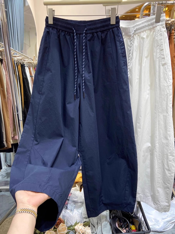 Női gyorsan száradó lezser nadrág, könnyű nyári, széles láb, magas derék, állítható zsinóros derekú, 70–80% poliészter