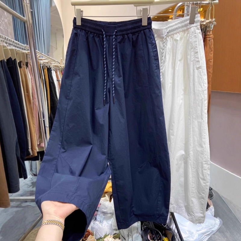Női gyorsan száradó lezser nadrág, könnyű nyári, széles láb, magas derék, állítható zsinóros derekú, 70–80% poliészter