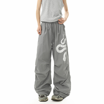 Női tréner nadrág kígyó motívummal, street hipster cargo stílus, lazább szabású, széles lábszárú, középmagas derekú, poliészter-keverék
