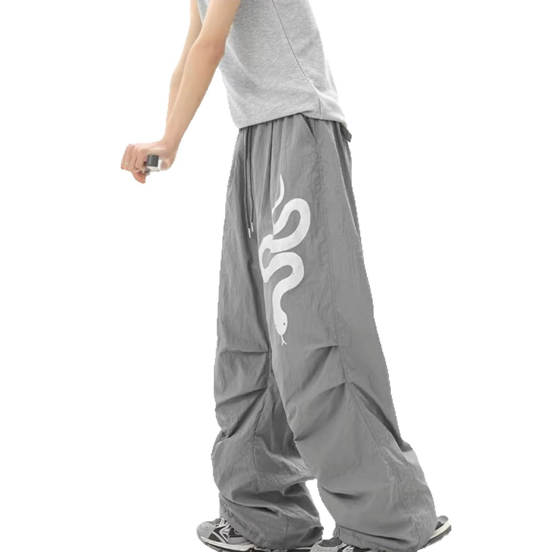 Női tréner nadrág kígyó motívummal, street hipster cargo stílus, lazább szabású, széles lábszárú, középmagas derekú, poliészter-keverék