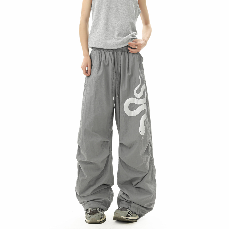 Női tréner nadrág kígyó motívummal, street hipster cargo stílus, lazább szabású, széles lábszárú, középmagas derekú, poliészter-keverék