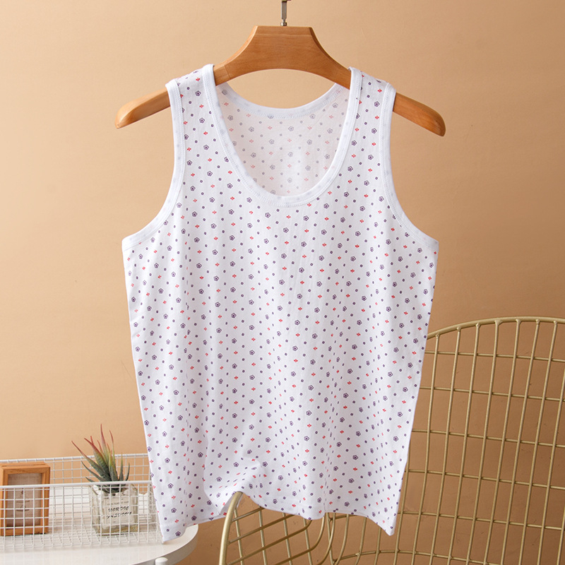 Moteriška medvilninė liemenė su plačiomis pečių juostomis, 100% medvilnė, apvali kaklo linija, plonas audinys 121–140 g/m2, tinkama visoms sezonoms.