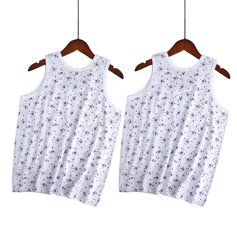 Moteriška medvilninė liemenė su plačiomis pečių juostomis, 100% medvilnė, apvali kaklo linija, plonas audinys 121–140 g/m2, tinkama visoms sezonoms.