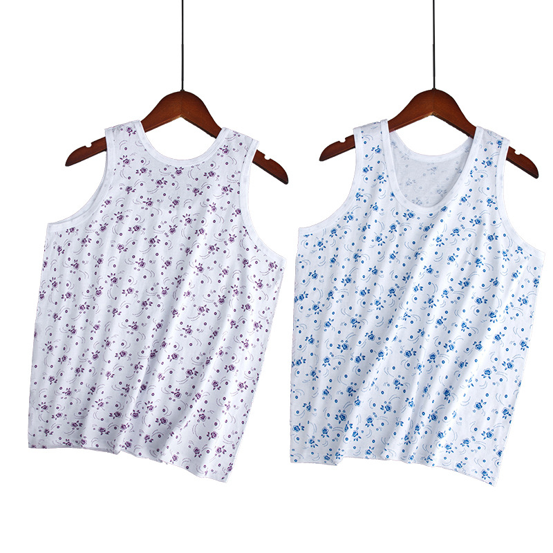 Moteriška medvilninė liemenė su plačiomis pečių juostomis, 100% medvilnė, apvali kaklo linija, plonas audinys 121–140 g/m2, tinkama visoms sezonoms.