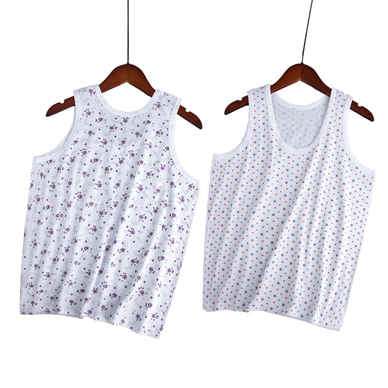 Moteriška medvilninė liemenė su plačiomis pečių juostomis, 100% medvilnė, apvali kaklo linija, plonas audinys 121–140 g/m2, tinkama visoms sezonoms.