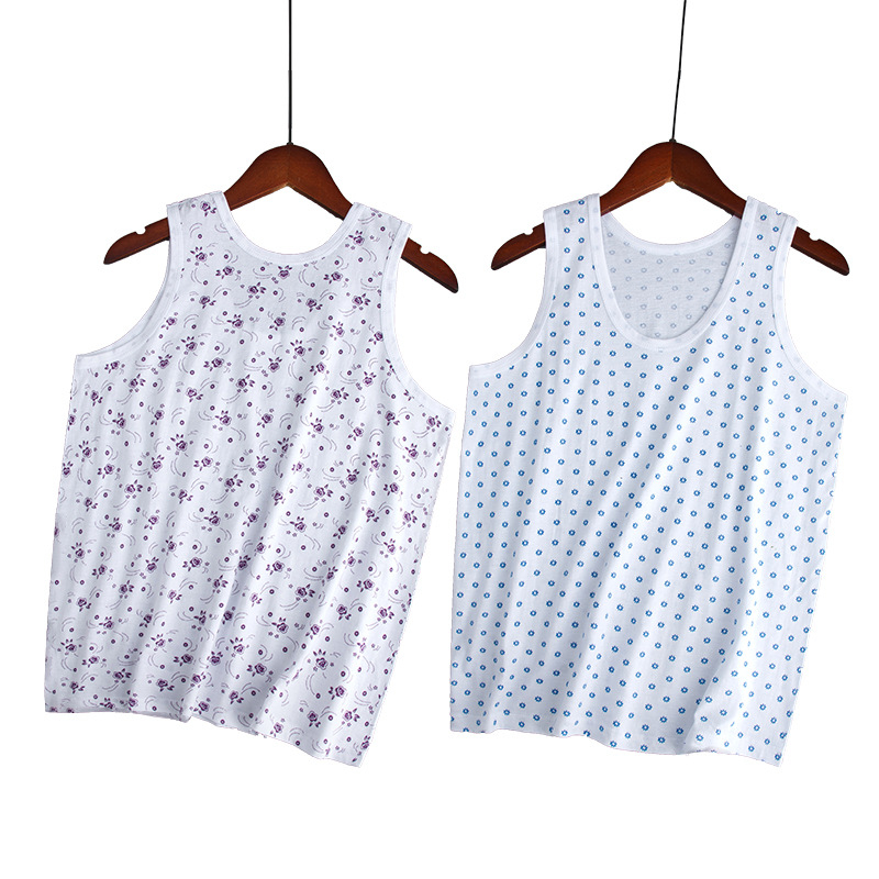 Moteriška medvilninė liemenė su plačiomis pečių juostomis, 100% medvilnė, apvali kaklo linija, plonas audinys 121–140 g/m2, tinkama visoms sezonoms.