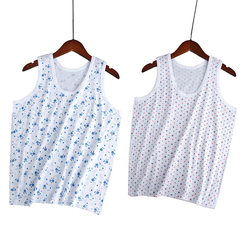 Moteriška medvilninė liemenė su plačiomis pečių juostomis, 100% medvilnė, apvali kaklo linija, plonas audinys 121–140 g/m2, tinkama visoms sezonoms.