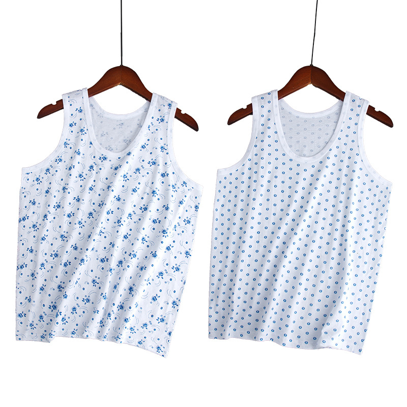 Moteriška medvilninė liemenė su plačiomis pečių juostomis, 100% medvilnė, apvali kaklo linija, plonas audinys 121–140 g/m2, tinkama visoms sezonoms.