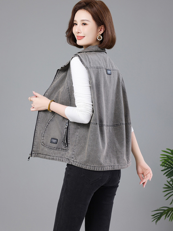 Ženska vesta slobodnog kroja, pamuk 95%+, prednji zip, ovratnik tip lapel, duljina 50–65 cm