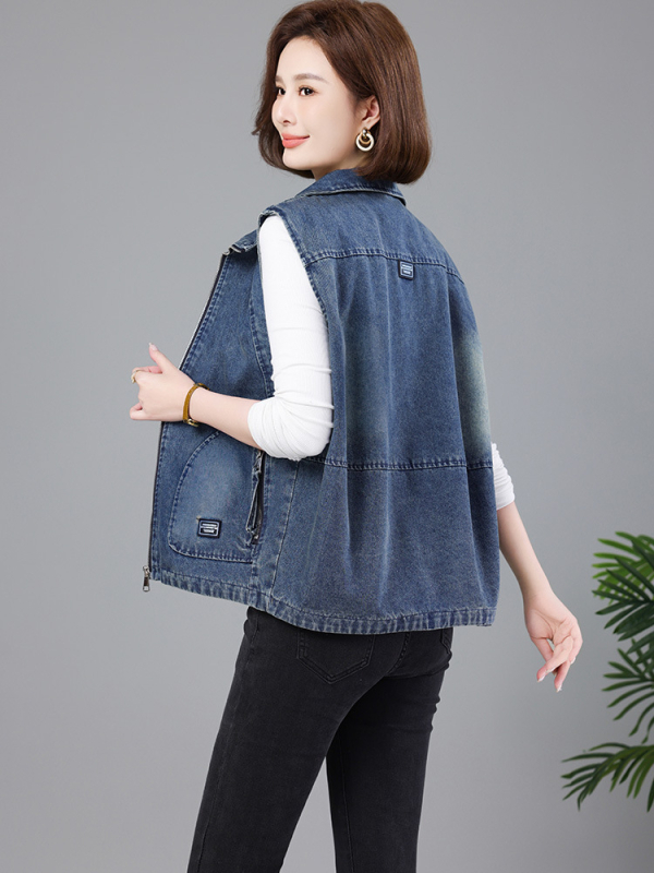 Ženska vesta slobodnog kroja, pamuk 95%+, prednji zip, ovratnik tip lapel, duljina 50–65 cm