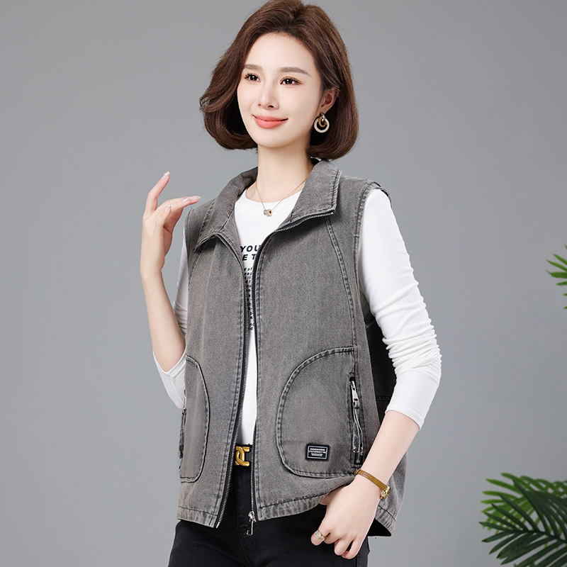 Ženska vesta slobodnog kroja, pamuk 95%+, prednji zip, ovratnik tip lapel, duljina 50–65 cm