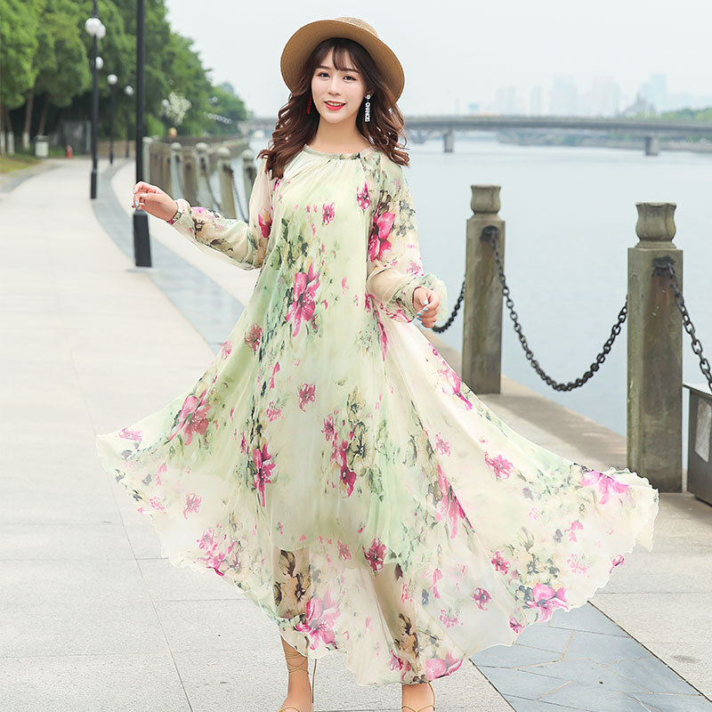 Chiffon ruha hosszú ujjú, virágos mintázat, V-nyak, lótuszleveles ujj, hosszú szoknya, pulóver-stílusú záródás; fő anyagok Lyocell (Tencel) és poliészter 95%+