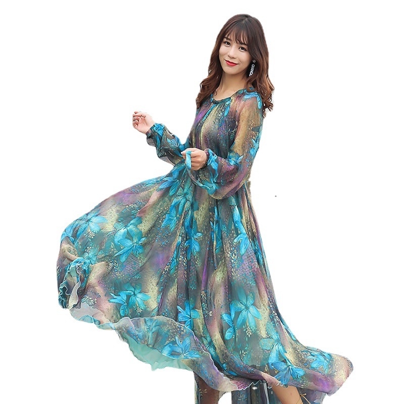 Chiffon ruha hosszú ujjú, virágos mintázat, V-nyak, lótuszleveles ujj, hosszú szoknya, pulóver-stílusú záródás; fő anyagok Lyocell (Tencel) és poliészter 95%+