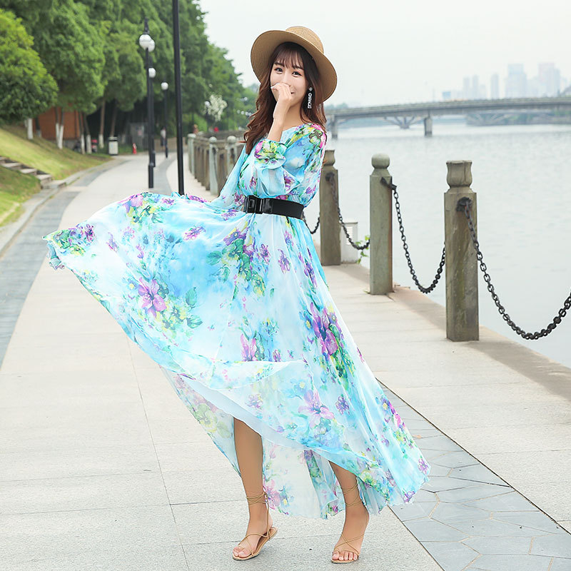 Chiffon ruha hosszú ujjú, virágos mintázat, V-nyak, lótuszleveles ujj, hosszú szoknya, pulóver-stílusú záródás; fő anyagok Lyocell (Tencel) és poliészter 95%+