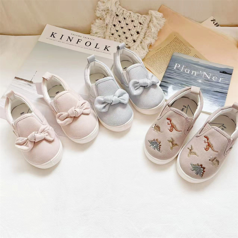 Unisex dječje platnene tenisice slip-on s dinosaurusom i slatkom mašnicom