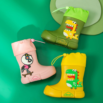 Gyerekeknek esőcsizma - EVA felsőrész, középső csőmagasság, lapos sarok, rajzfilm dinoszaurusz mintával, uniszex