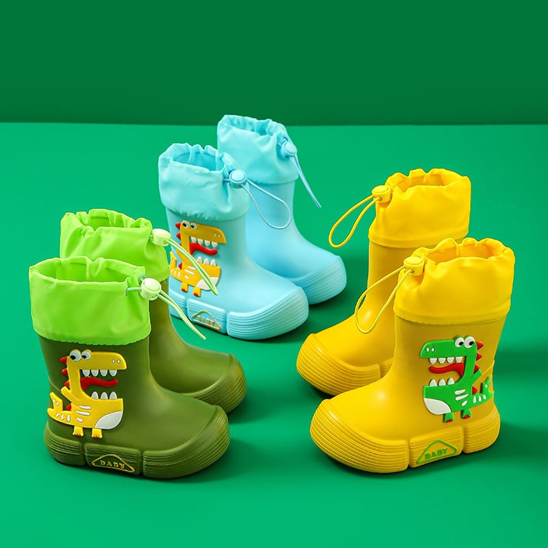 Gyerekeknek esőcsizma - EVA felsőrész, középső csőmagasság, lapos sarok, rajzfilm dinoszaurusz mintával, uniszex