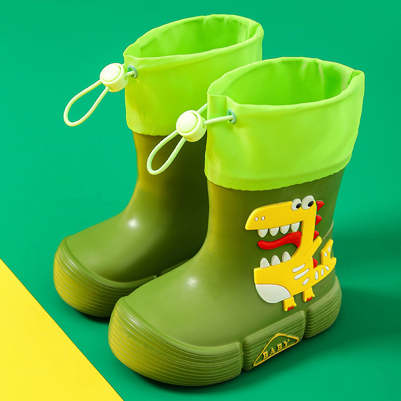 Gyerekeknek esőcsizma - EVA felsőrész, középső csőmagasság, lapos sarok, rajzfilm dinoszaurusz mintával, uniszex