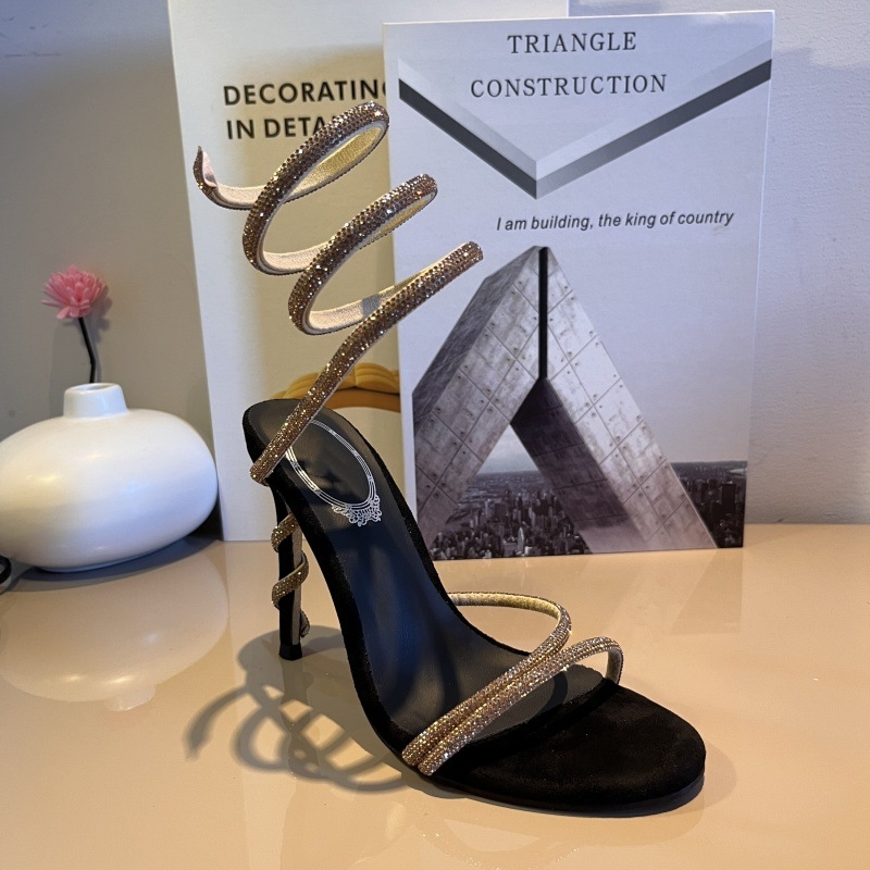 Ženske stiletto sandale s kristalno zmijskim uzorkom, otvoreni prst i remenčići; visina pete 6–8 cm; gornji materijal: Super Fiber; ulošak: prirodna koža; potplat: guma