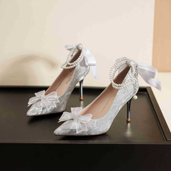 Ženske visoke potpetice: oštar nos, tanak štikla, traka s perlom, gumena potplat, nad 8 cm