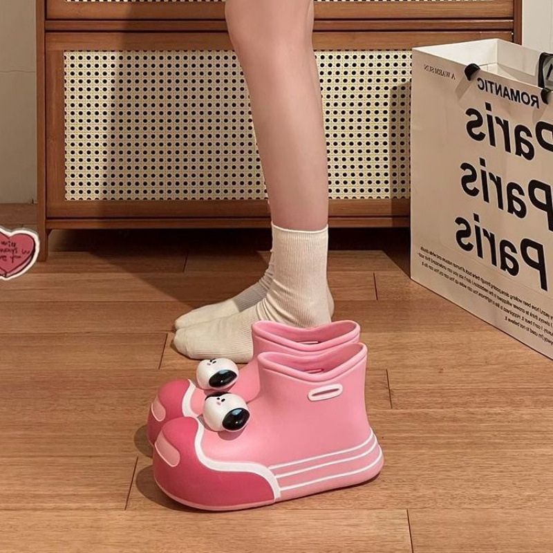 Cizme de ploaie pentru femei din cauciuc, impermeabile, cu gambă medie, toc 3–5 cm, destinate utilizării în exterior.