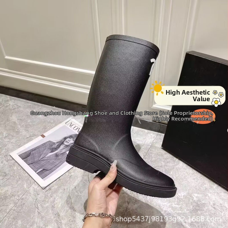 Cizme de ploaie pentru femei, partea superioară Crosyile din rășină, înălțime medie până la gambe, toc 3–5 cm, închidere slip-on