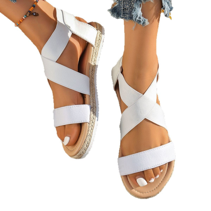 Dámske sandále s jedným pásom — vrchný materiál textil, podrážka z gumy, okrúhla špička, nízky členok, elastický pás, plošná podrážka, pohodlné.