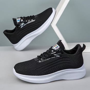 Női légáteresztő hálós felső részű sportcipő, fűzőkkel, alacsony szárú, kerek orrú, injekcióval formázott műanyag talp