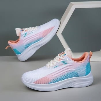 Női légáteresztő hálós felső részű sportcipő, fűzőkkel, alacsony szárú, kerek orrú, injekcióval formázott műanyag talp