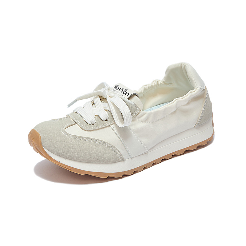 Ženske casual tenisice, platnena gornja, gumeni potplat, srednja visina peta 3–5 cm, prednje vezivanje