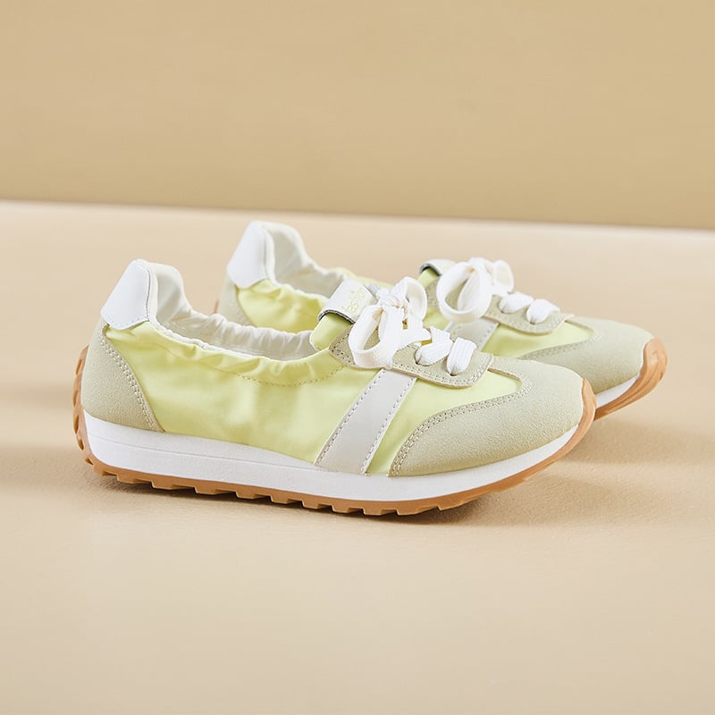 Ženske casual tenisice, platnena gornja, gumeni potplat, srednja visina peta 3–5 cm, prednje vezivanje