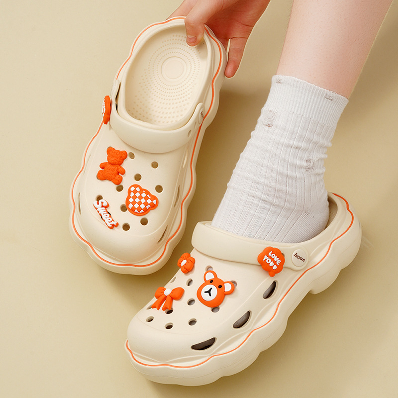 Sieviešu kurpes ar caurumiem – EVA zole, EVA augšējā daļa (Materiāls zoles: EVA; Materiāls augšējā daļa: EVA; Zoles biezums: 4; Pielāgots dizains: Jā; Dzimums: Sievietes)