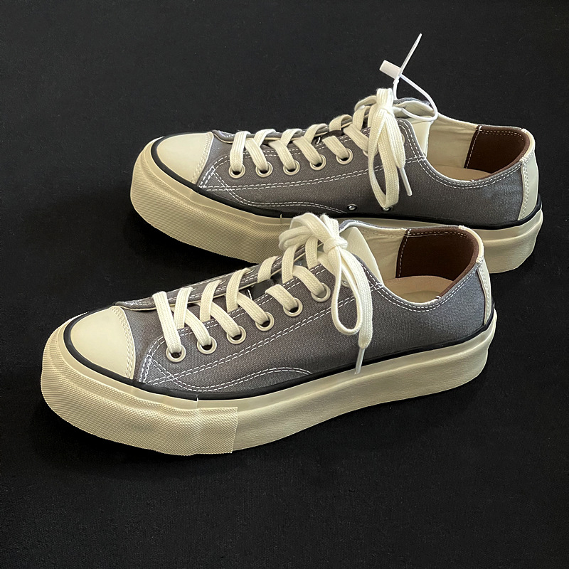 Uniszex edzőcipő vastag talppal, vulkanizált szerkezettel, vászon felsőrész, gumi talp, fűzővel záródó