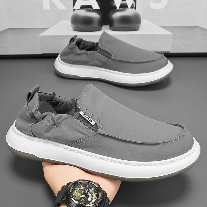 Muške slip-on tenisice, prozračni tekstilni gornji dio, okrugla prst, niski profil, EVA potplat