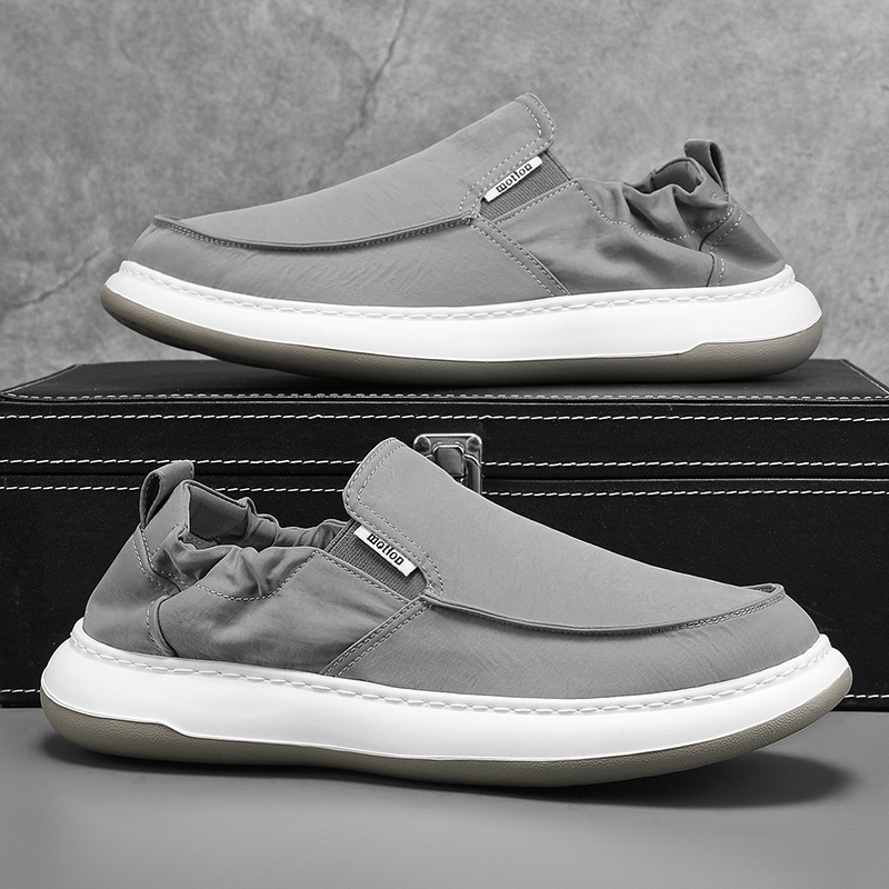 Muške slip-on tenisice, prozračni tekstilni gornji dio, okrugla prst, niski profil, EVA potplat