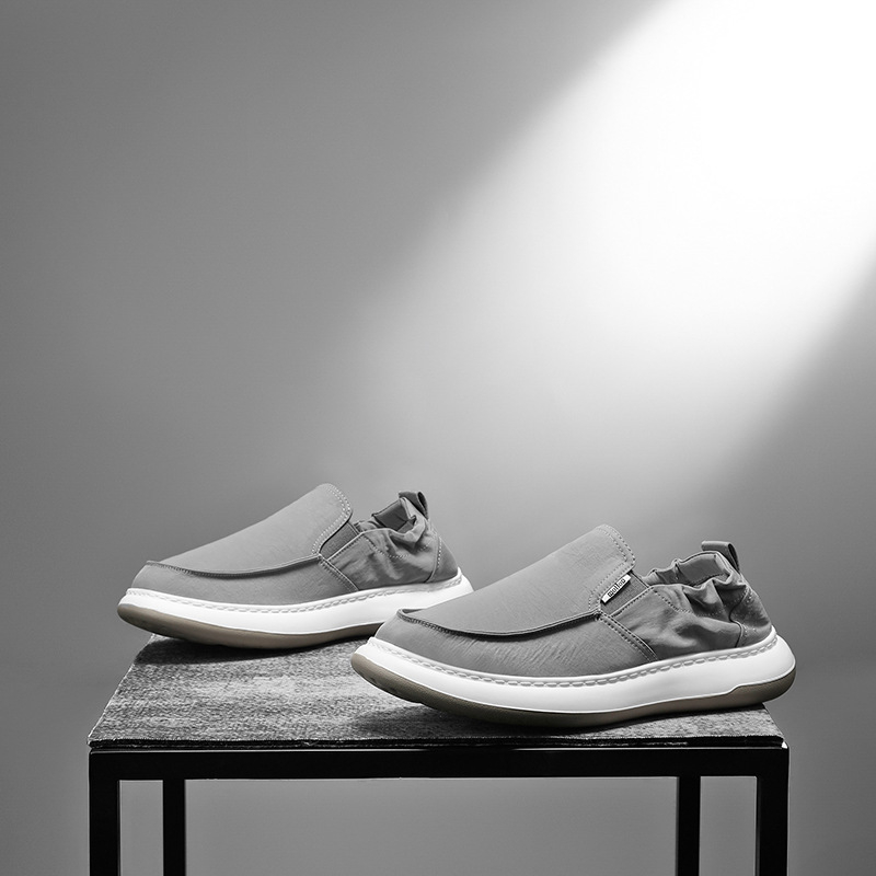 Muške slip-on tenisice, prozračni tekstilni gornji dio, okrugla prst, niski profil, EVA potplat